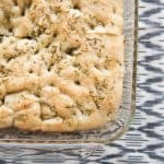 This Easy Rosemary Focaccia Bread recipe is so simple to make and ready in under an hour, so you can have fresh, warm bread with dinner tonight!  If you are looking for an easy focaccia bread recipe, this is it.