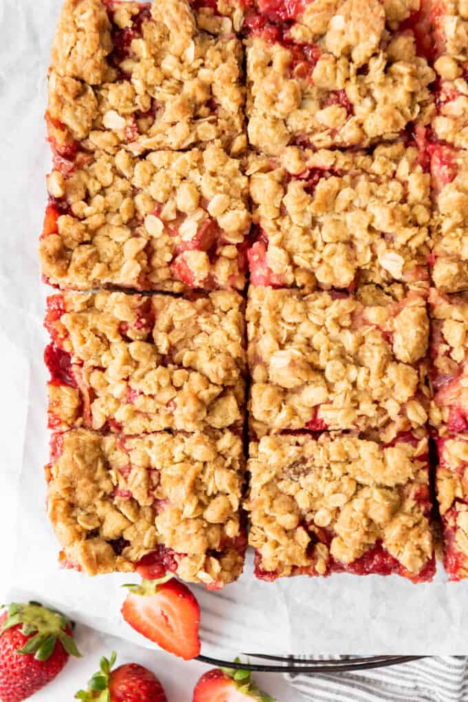 An overhead image showing the texture of oat crisp on strawberry rhubarb jam bars.
