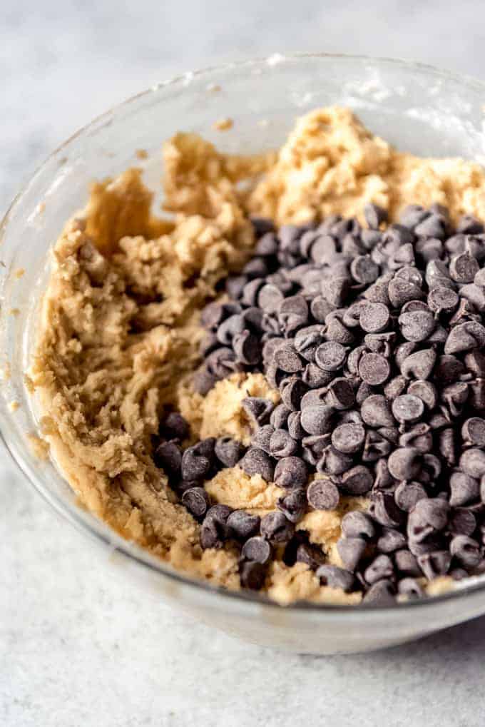 An image of semisweet chocolate chips in cookie dough.