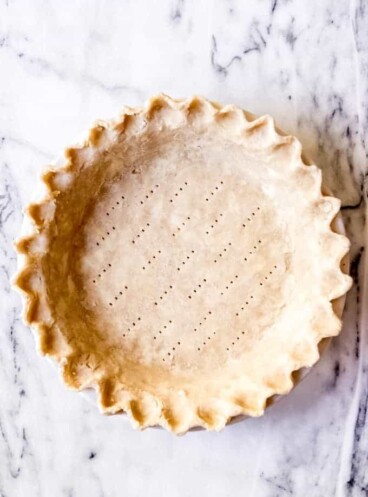 An image of an unbaked pie crust.