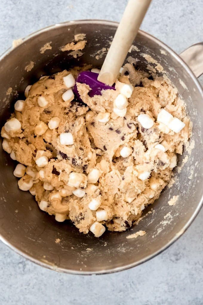 An image of chocolate chip cookie dough with marshmallows in it.