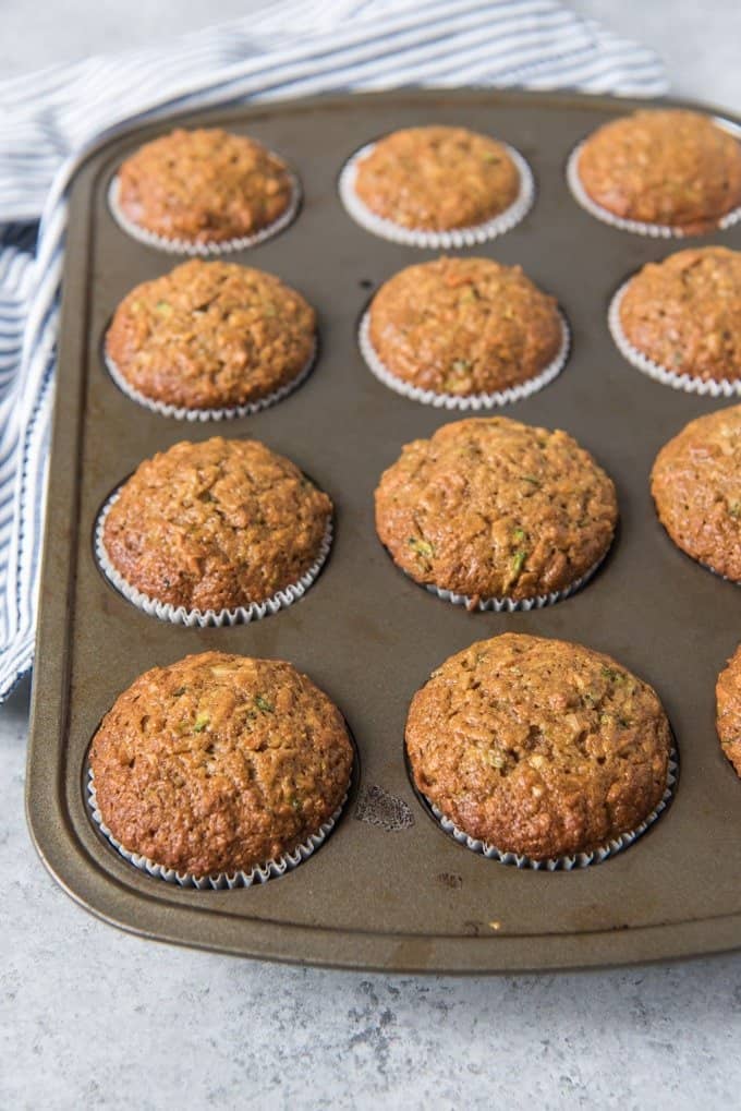 Morning glory muffins in a pan just out of the oven.