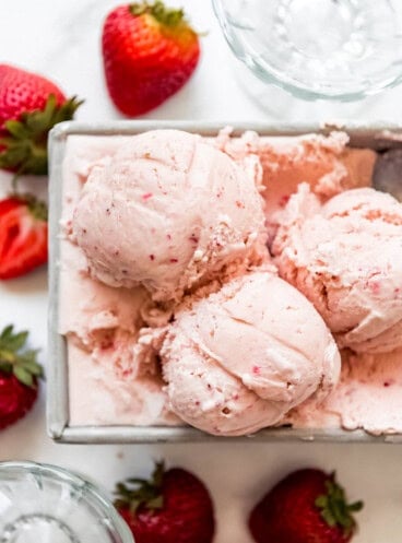 a close image of scoops of homemade strawberry ice cream