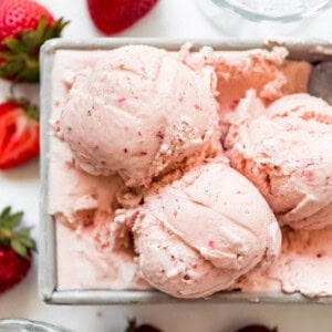 a close image of scoops of homemade strawberry ice cream