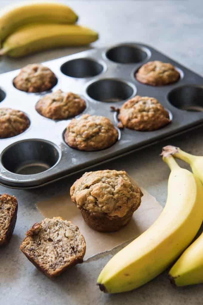 banana walnut muffins and whole bananas to the side