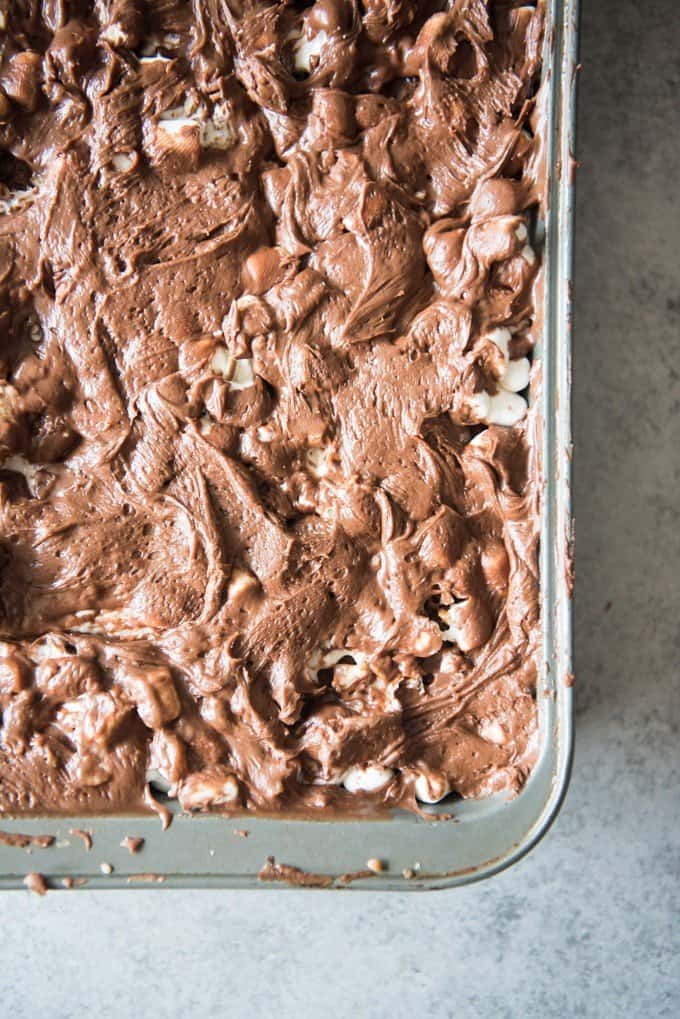 an upclose view of the corner of the baking dish filled with Mississippi Mud Brownie