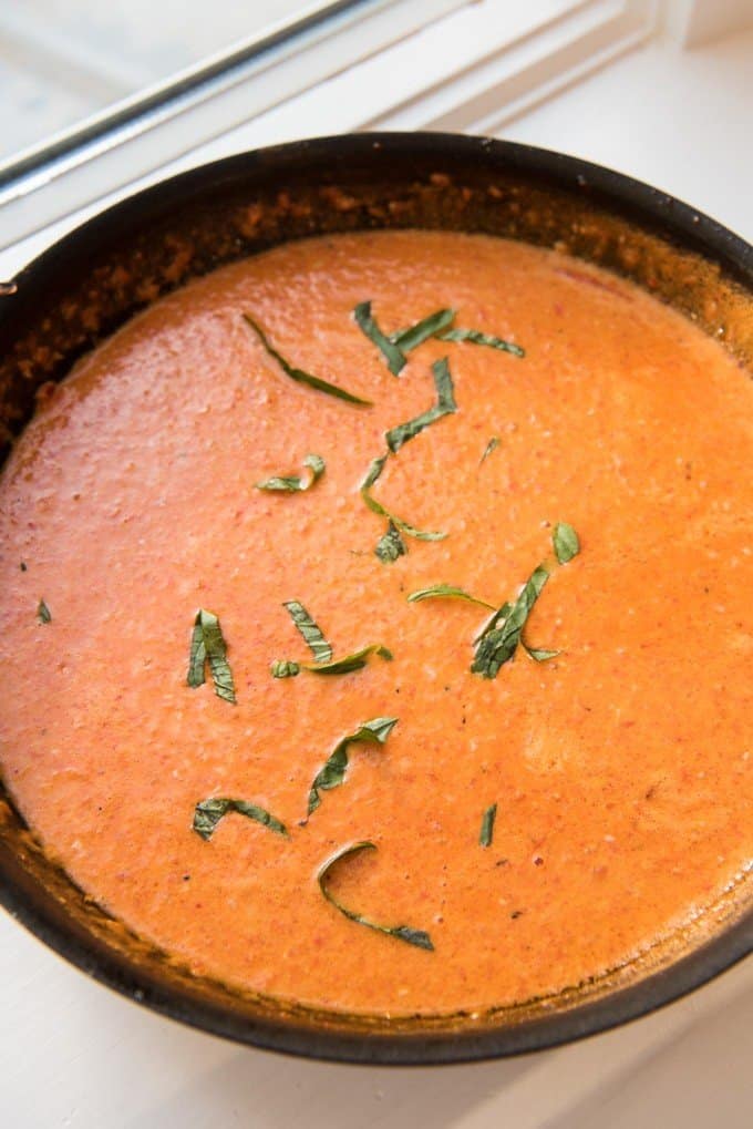 creamy roasted red pepper sauce in a skillet
