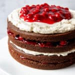 An easy, homemade black forest cake with chocolate layers and cherry filling.