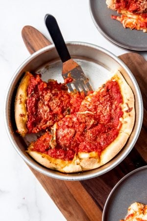 An image of a Chicago deep dish pizza in a 9-inch pan.