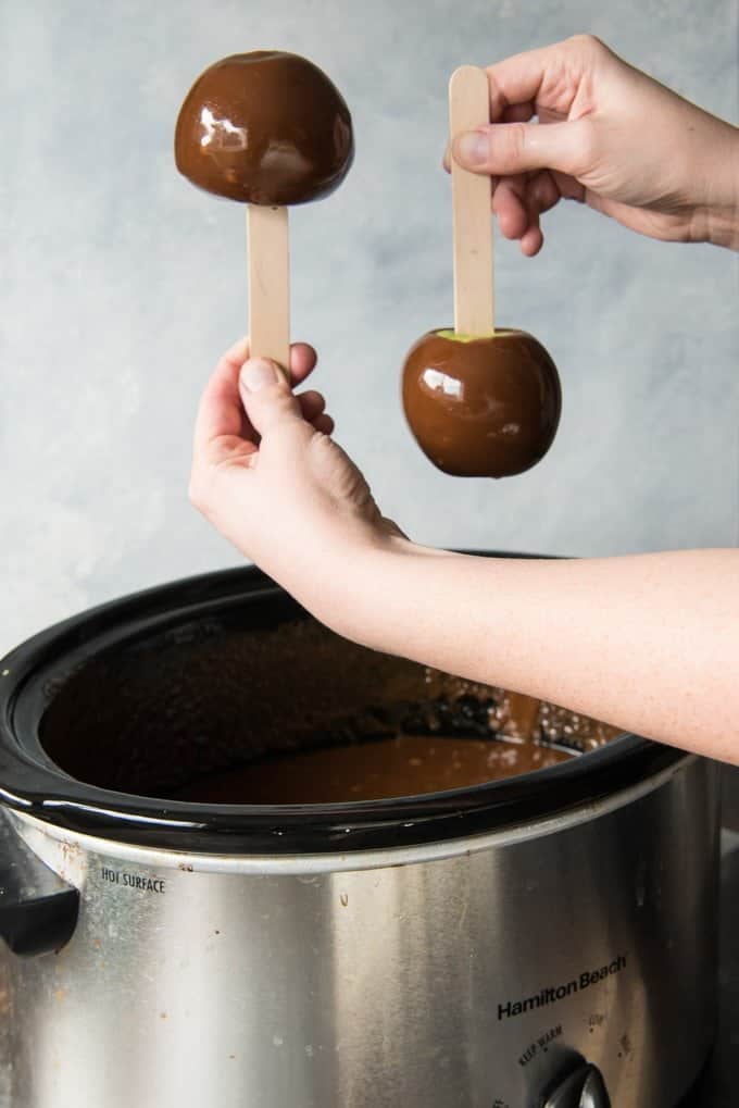 Gourmet Homemade Caramel Apples are so easy and fun to make! When the sweet, buttery caramel gets paired with crisp, tart apples, and then topped with as many crunchy, chewy, nutty or crispy toppings as you want, you will have confection perfection!