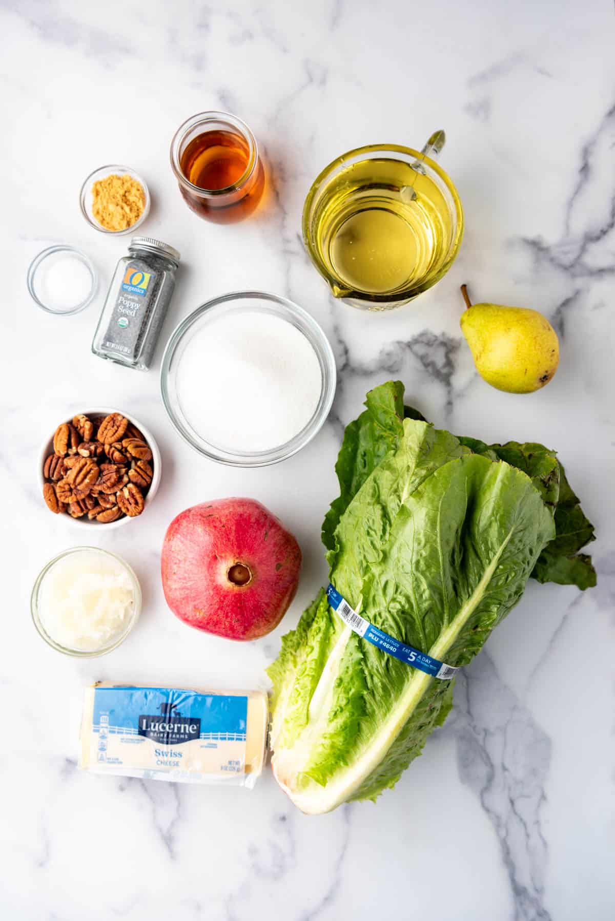 Ingredients for a pear and pomegranate salad.