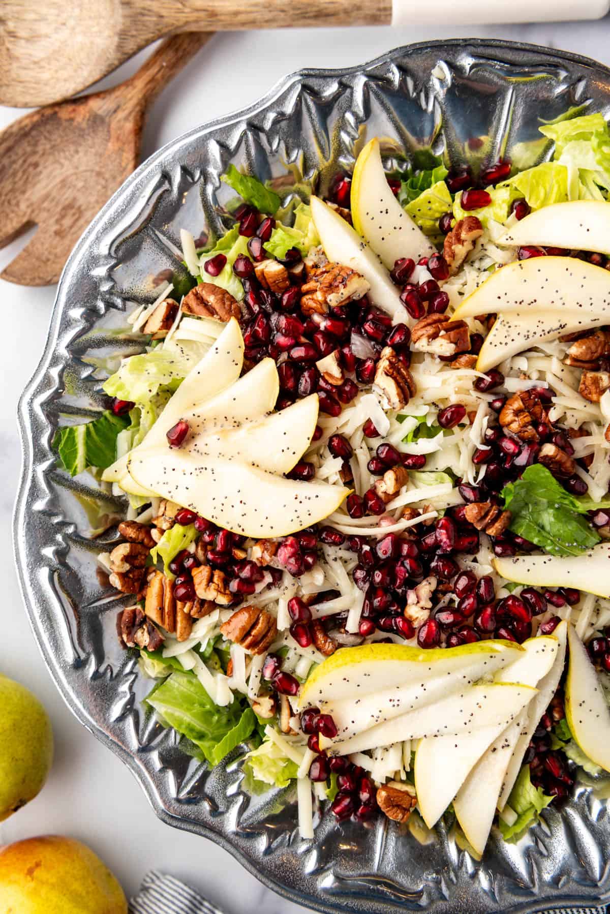 A winter salad with fresh fruit and poppy seed dressing.