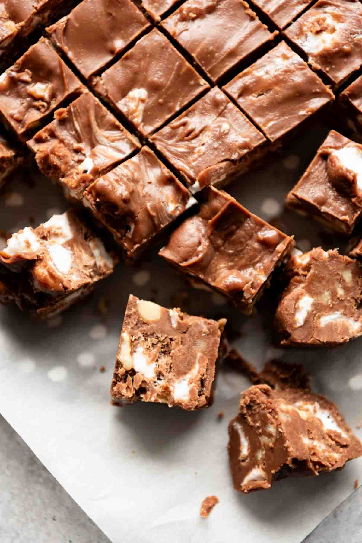 A close image of small squares of rocky road fudge.