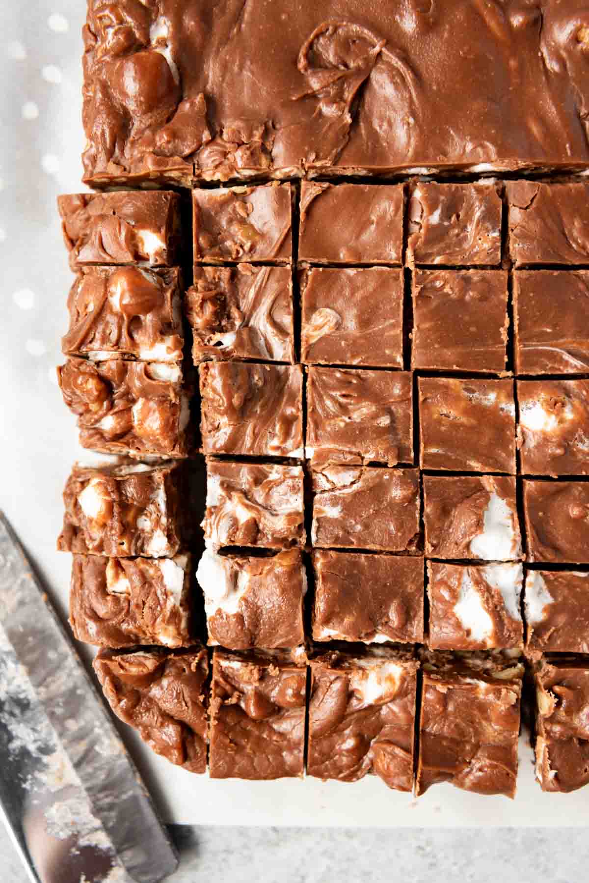 A close view of the small squares that the fudge was cut into for serving.