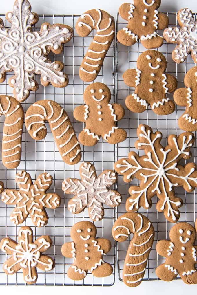decorated gingerbread cookies on a wire cooling rack