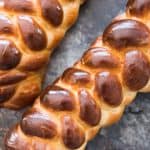 This recipe makes two gorgeous, rich, braided loaves of the best Challah Bread (sometimes called Egg Bread) you will ever eat! Have one loaf warm out of the oven and save the other loaf for French toast a few days later!