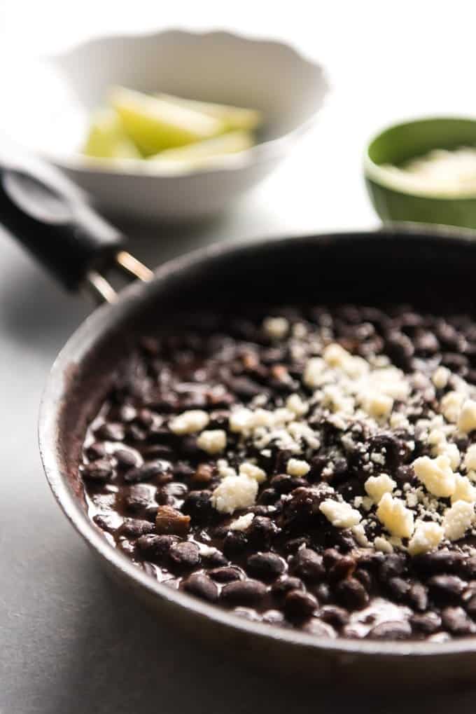 a skillet with black beans