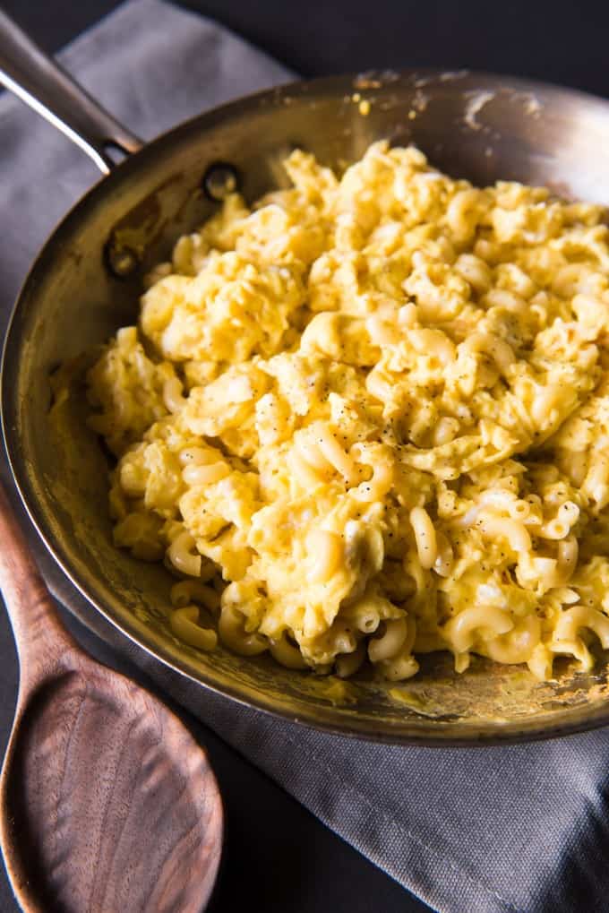 scrambled eggs and pasta inside a skillet