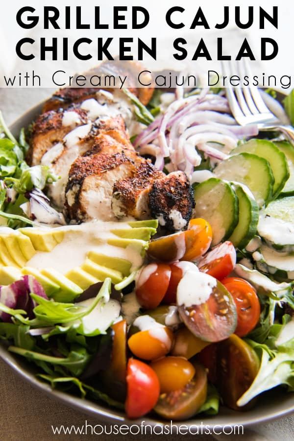 A grilled cajun chicken salad with text overlay.