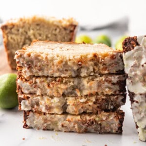 Stacks of coconut lime banana bread stacked on top of each other.