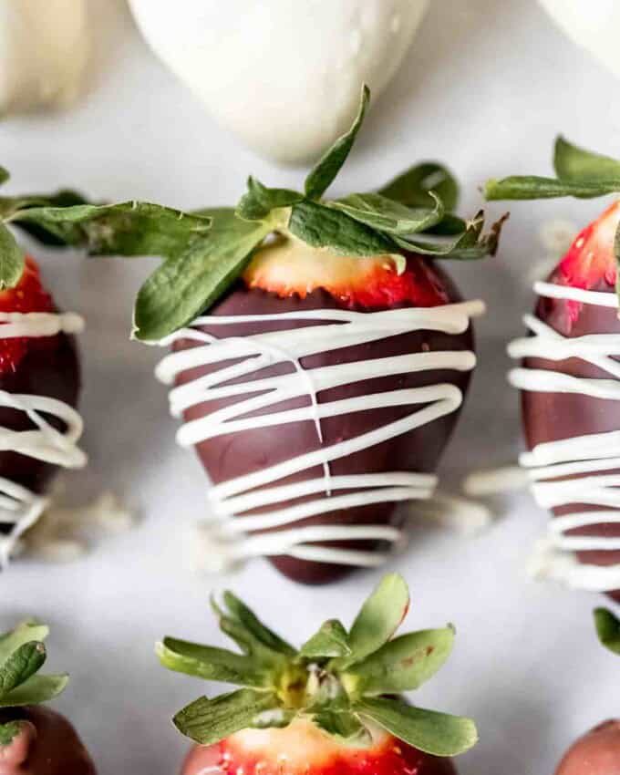 Strawberries covered in dark and white chocolate.