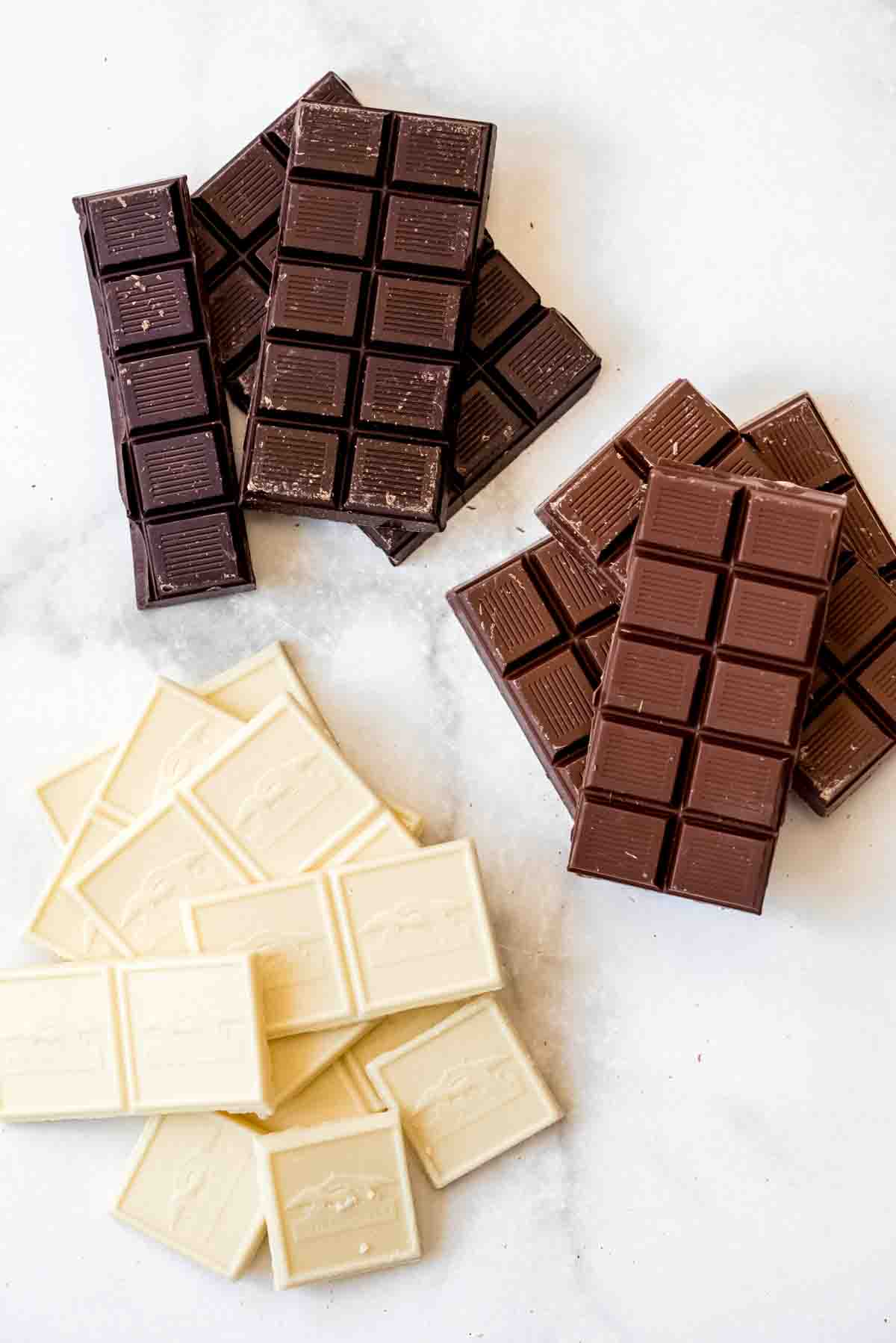 Bars of dark, white, and milk chocolate for melting.