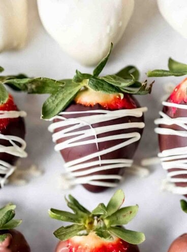 Strawberries covered in dark and white chocolate.