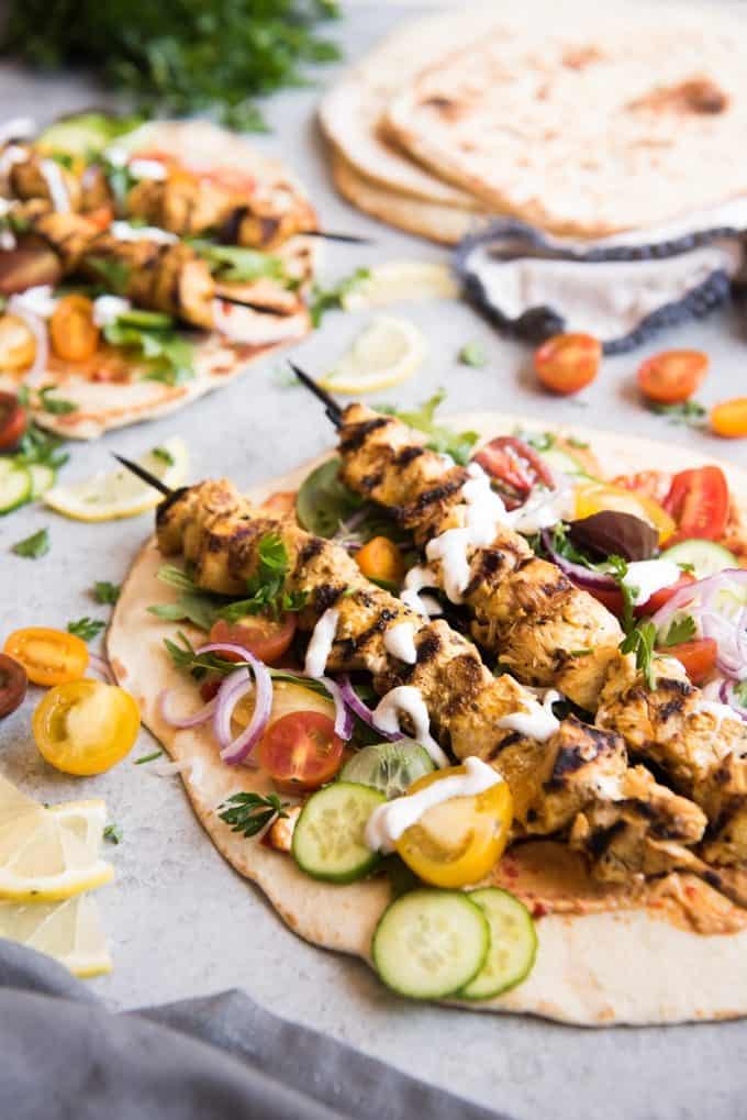 Grilled Chicken Shawarma Wraps are inspired by middle eastern street food where chicken is marinated in spices and then roasted on a spit to perfection and wrapped up in flatbread for a delicious sandwich. &nbsp;Beats takeout or fast food any day! Perfect for salads as well!