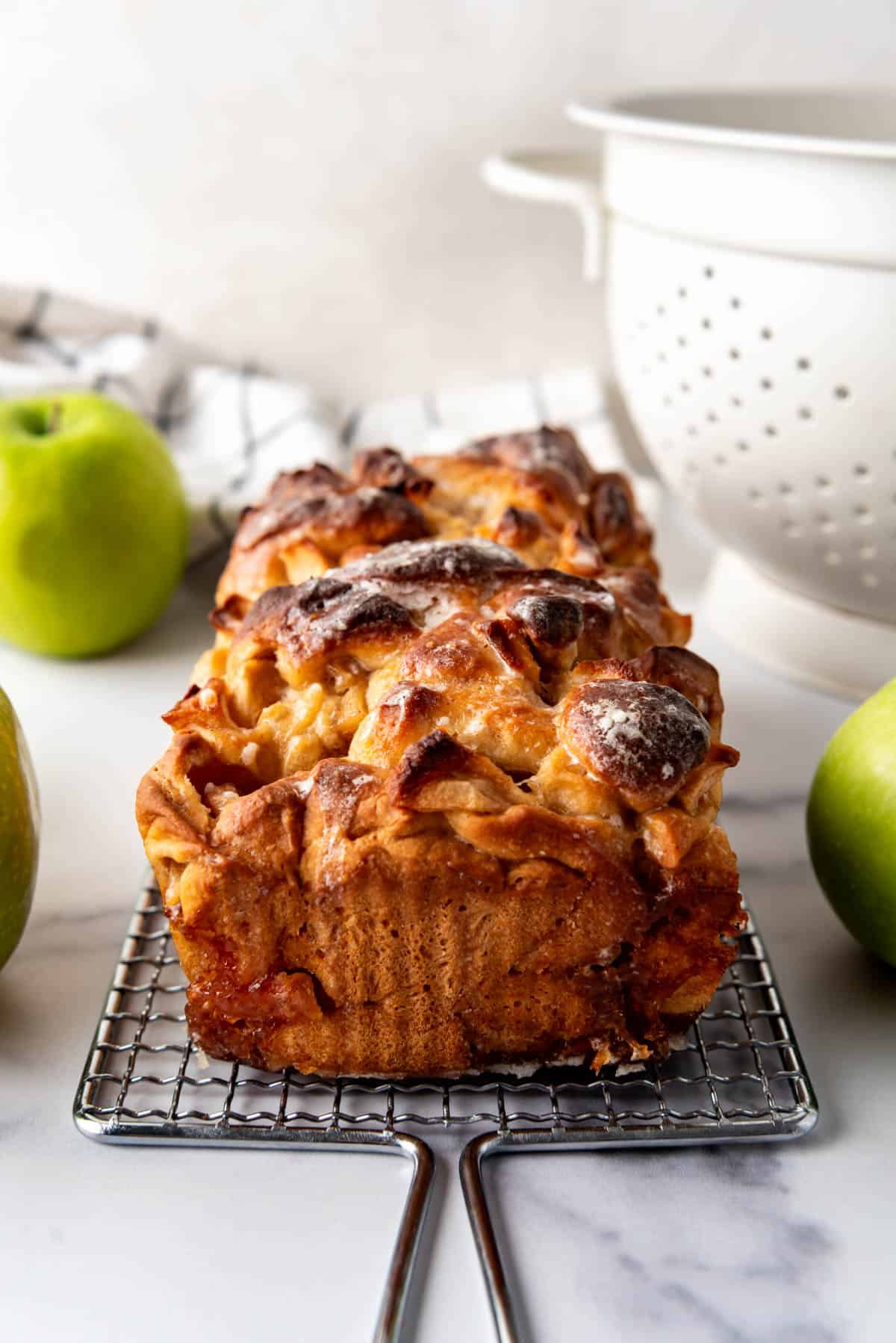 An image of a loaf of apple fritter bread.