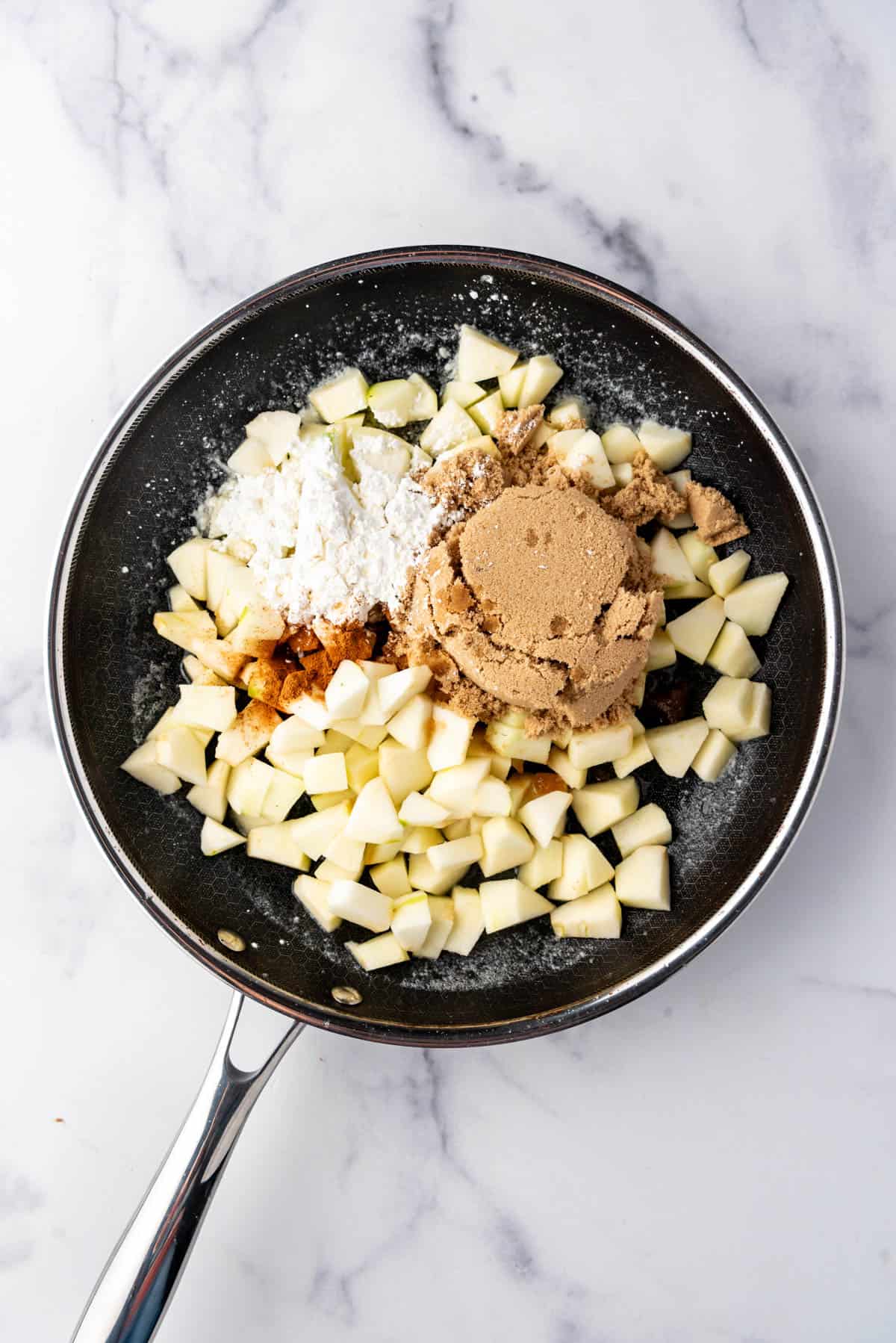 Making apple filling for apple fritter bread.