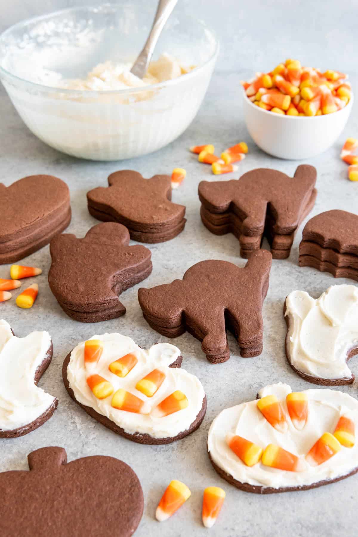 Frosted chocolate sugar cookies decorated with candy corn.