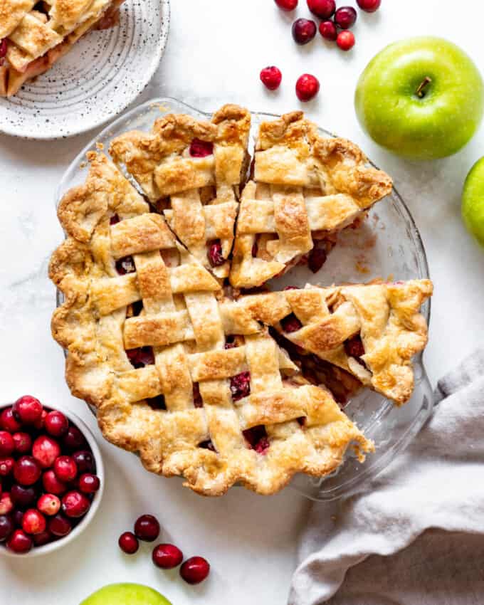An overhead image of a cranberry apple pie with lattice crust.