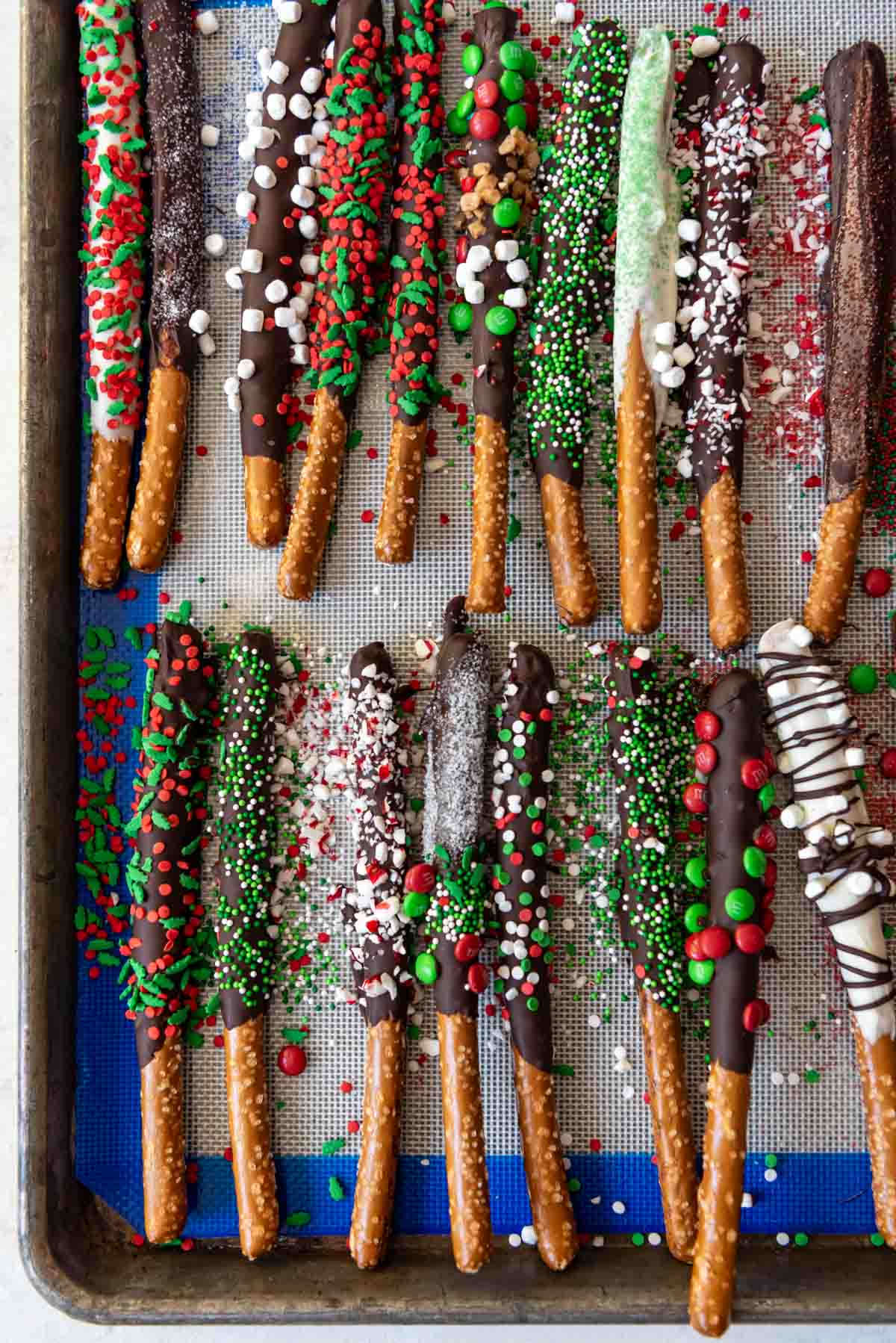 Baking sheet with chocolate covered pretzels.