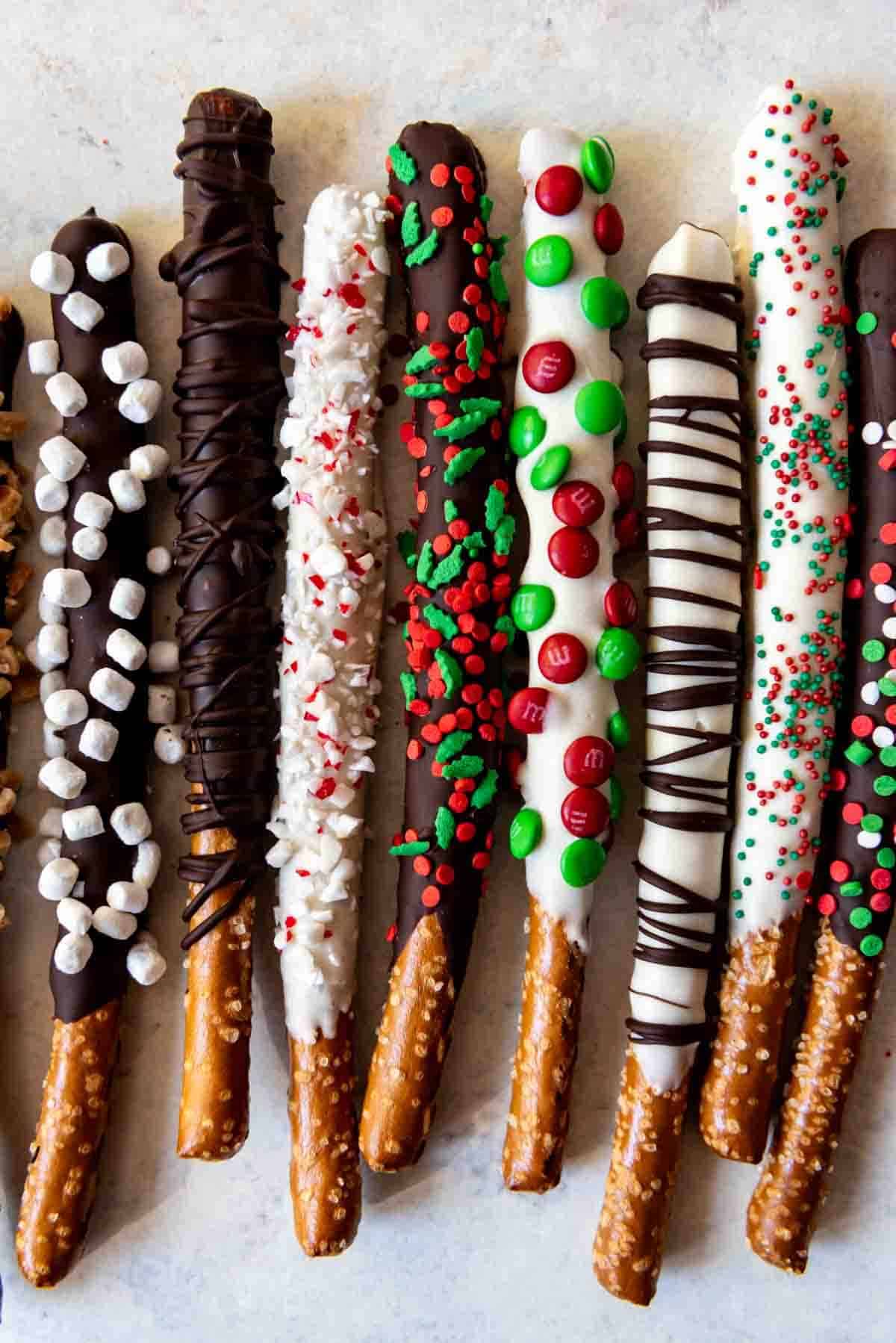 A row of festive looking chocolate covered pretzels.