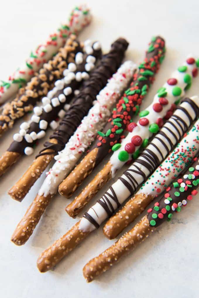 chocolate covered pretzels decorated differently and festively