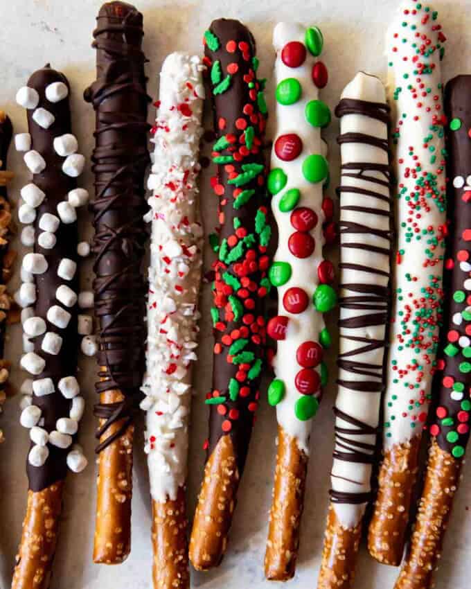 A row of festive looking chocolate covered pretzels.