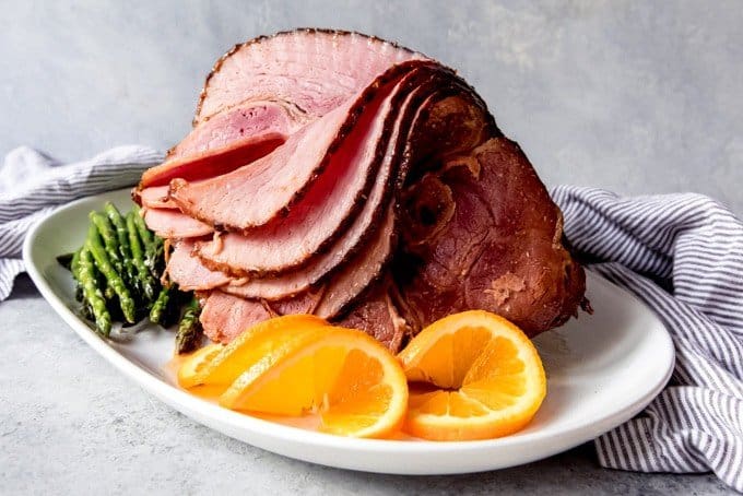 An image of a bone-in spiral-cut ham with an easy spiced glaze recipe.