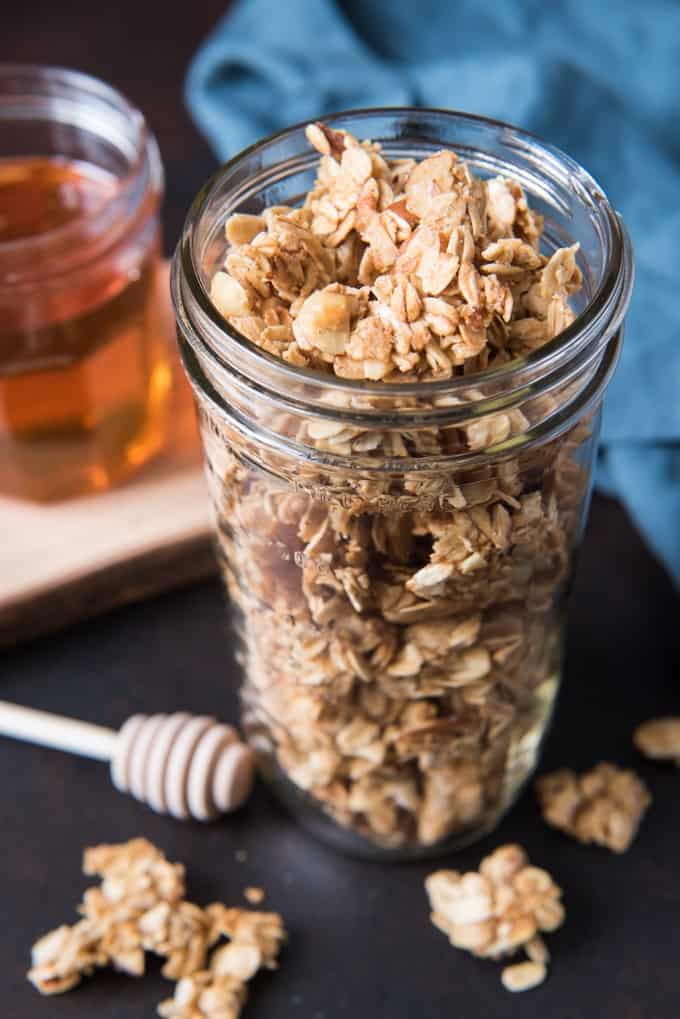a glass jar filled with homemade granola