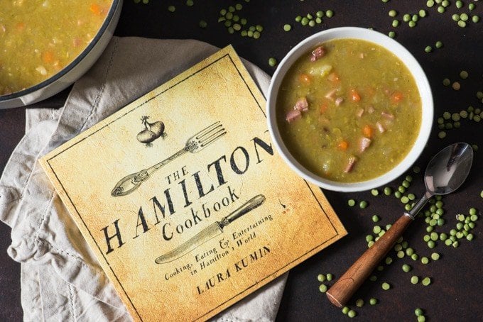 the hamilton cookbook and a bowl of split pea soup