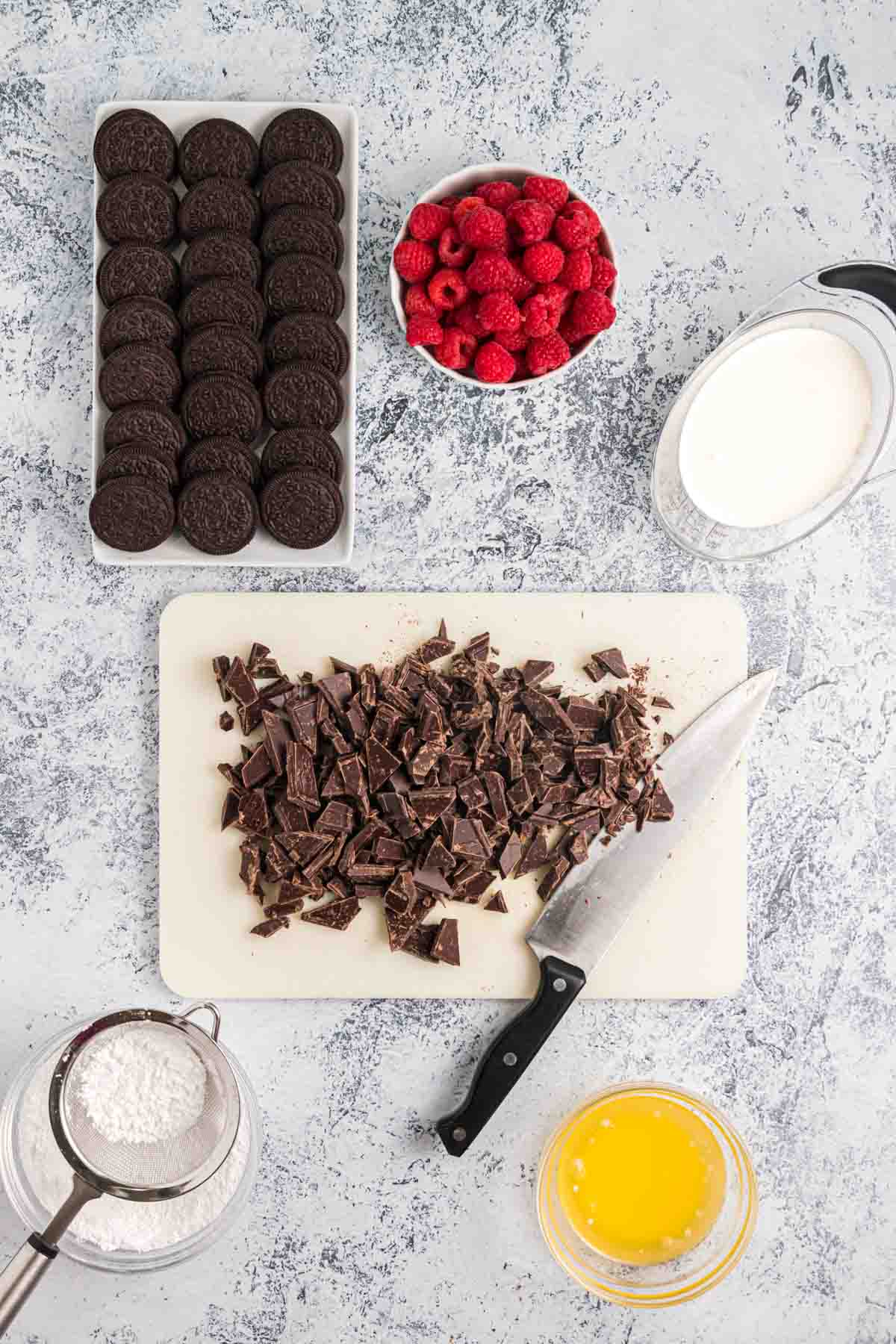 Ingredients for making a raspberry chocolate tart.