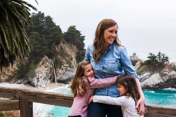 An image of a mother and two young children exploring Big Sur at McWay Falls.