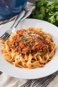 An image of a plate of tagliatelle bolognese with an authentic bolognese sauce recipe.