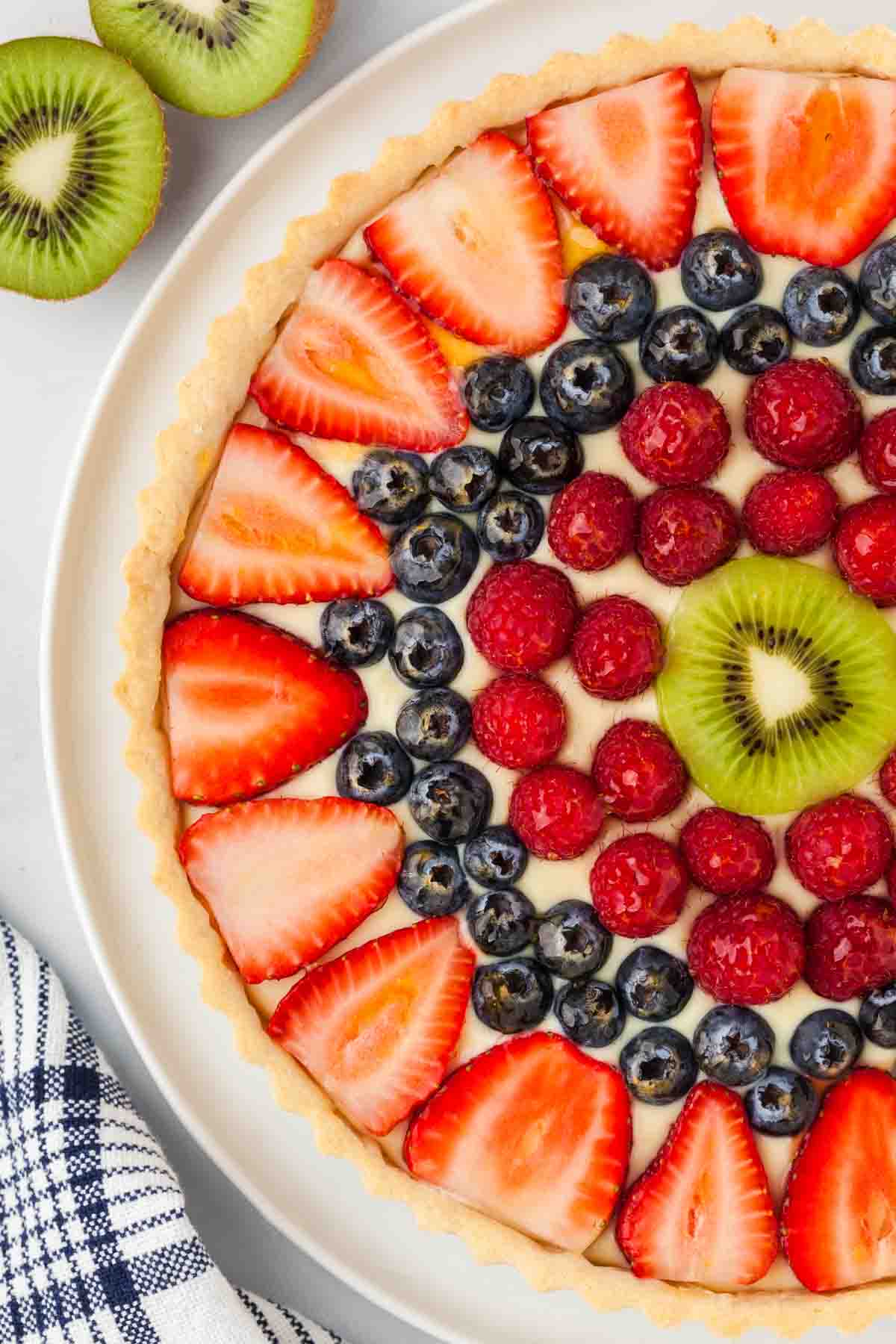 An overhead close up image of a fruit tart.