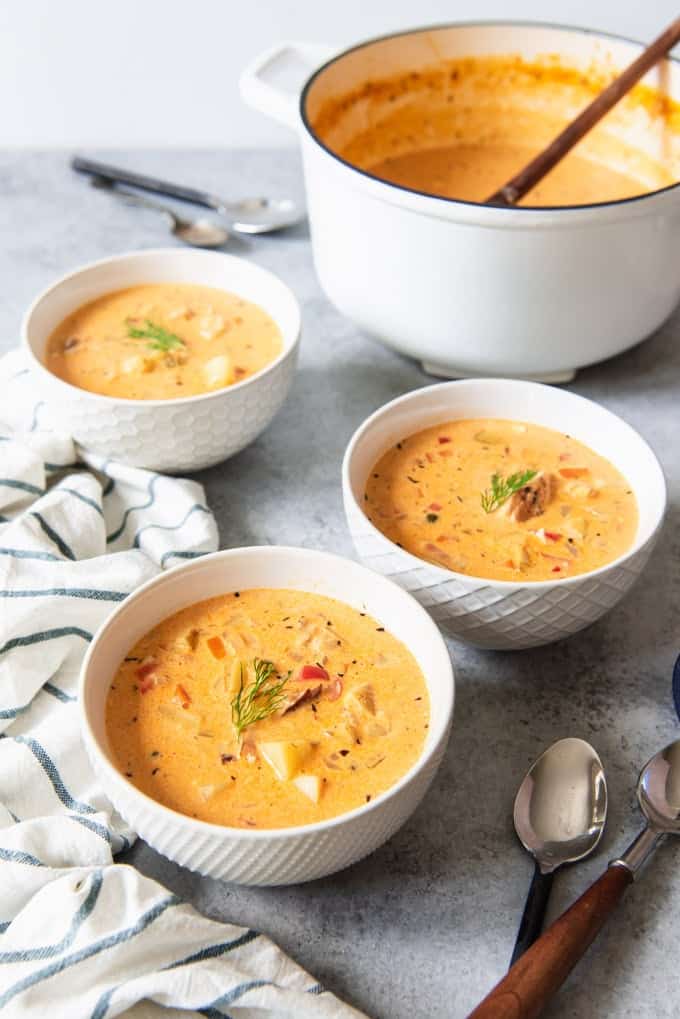 An image of bowls of Alaskan smoked salmon chowder, made famous at Pike's Place Market in Seattle.