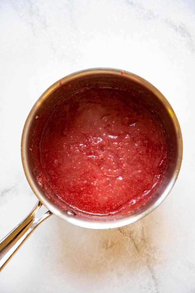 Cooked strawberry pie glaze for filling a fresh strawberry pie.