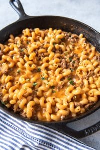 a cast iron skillet filled with cheeseurger pasta skillet meal