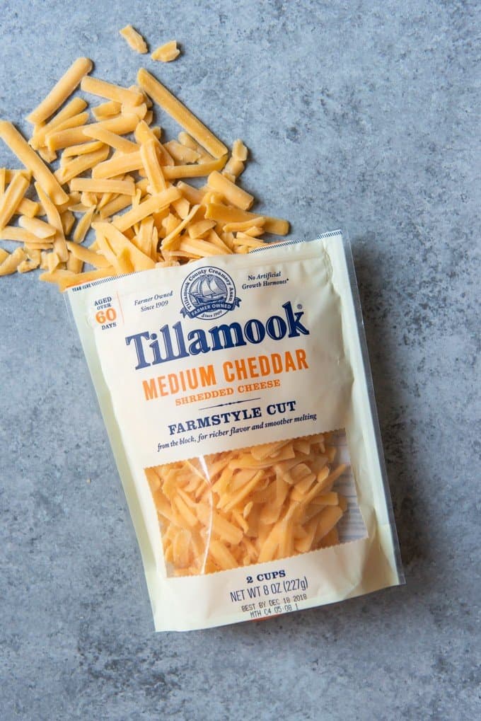An image of Tillamook farmstyle cut cheddar cheese.