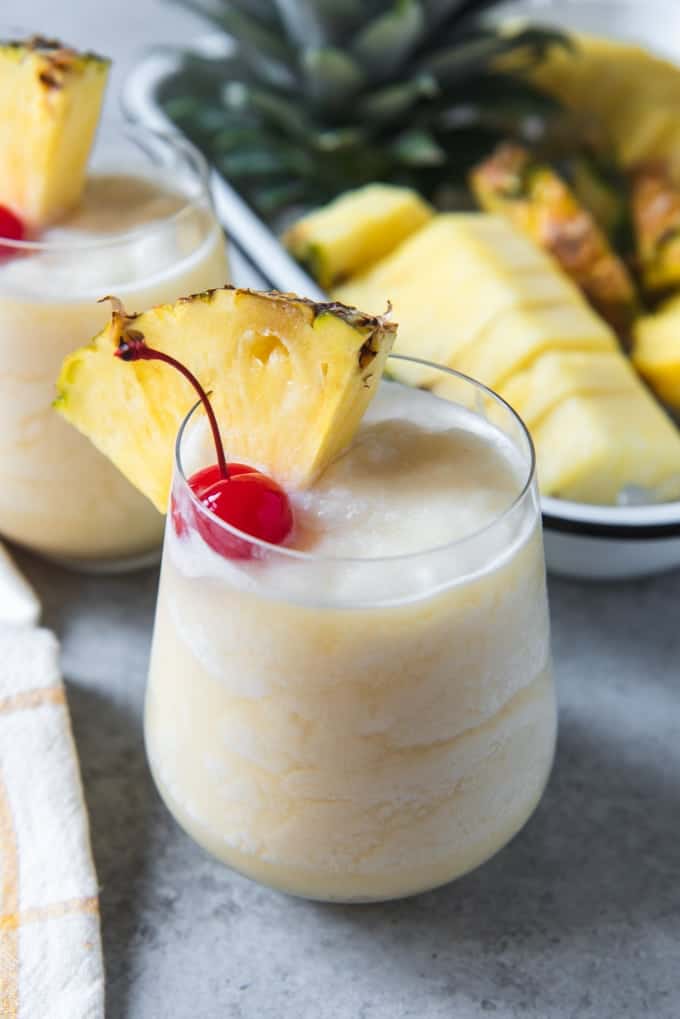 An image of a non-alcoholic pina colada recipe made with cream of coconut and pineapple juice.