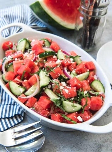 watermelon basil feta salad in a large white baking dish