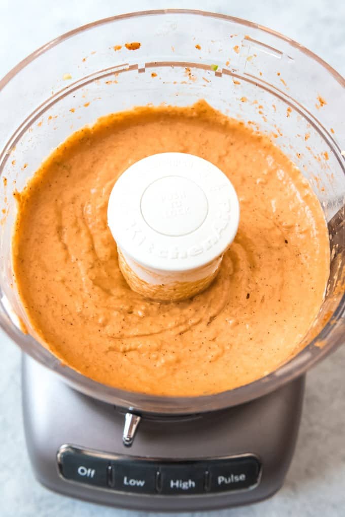 An image of pumpkin enchilada sauce in a food processor.